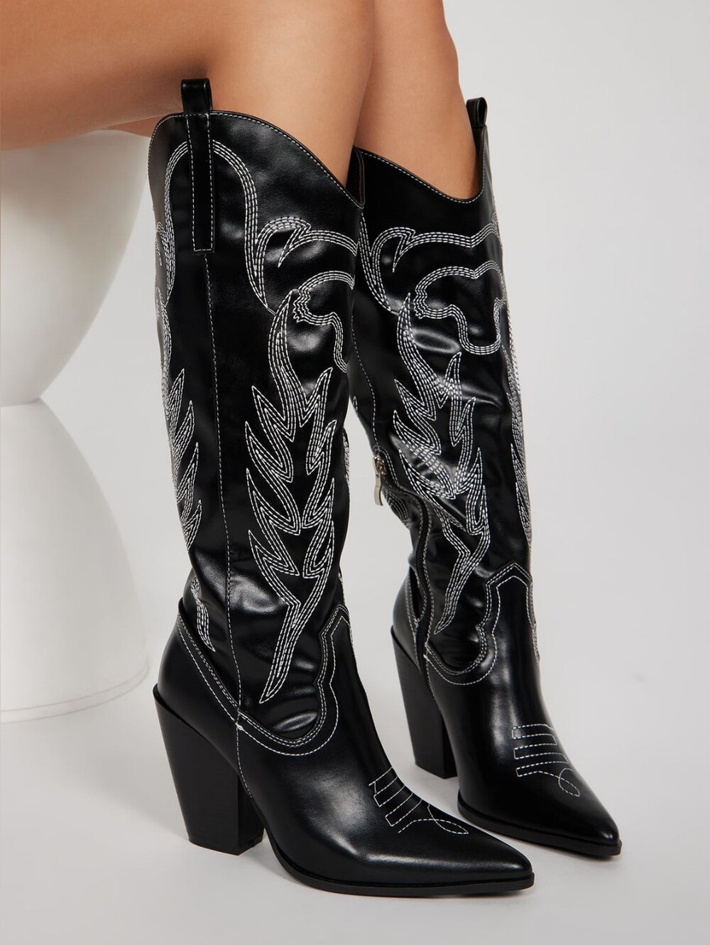 Stylish women's cowboy boots (cowboys) approximately knee-high